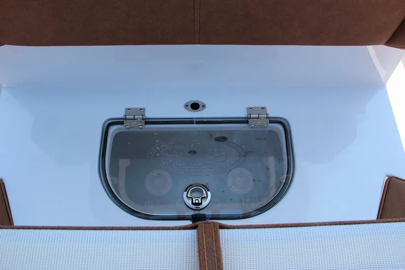Slide: The Image of 2025 Sea Hunt Ultra 275 SE livewell with transparent lid and brown seating. - 28