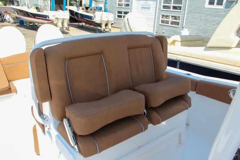 Slide: The Image of Brown cushioned seating on 2025 Sea Hunt Ultra 275 SE boat. - 39
