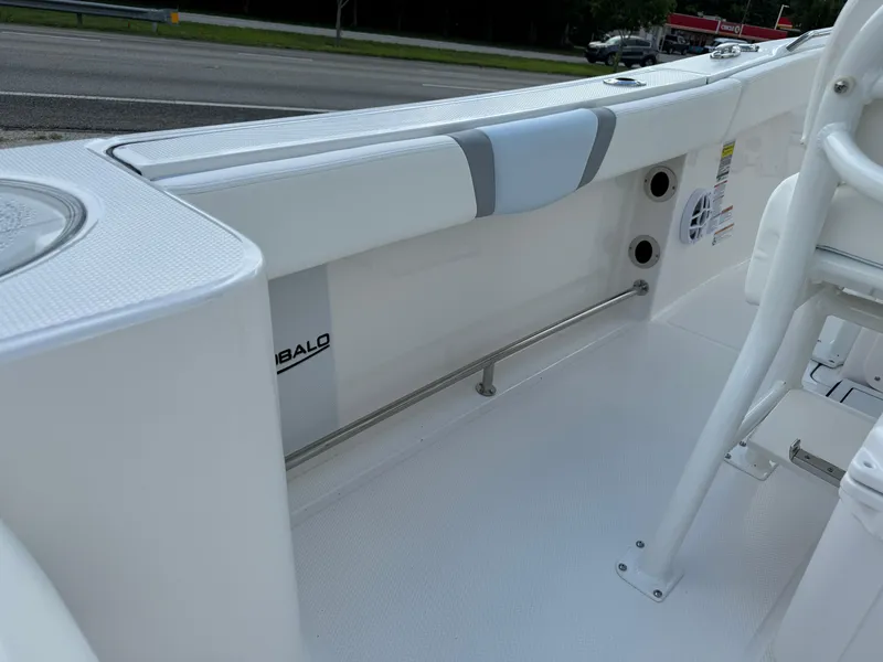 Slide: The Image of 2025 Robalo R230 Center Console boat interior, featuring sleek white design and modern fittings. - 9