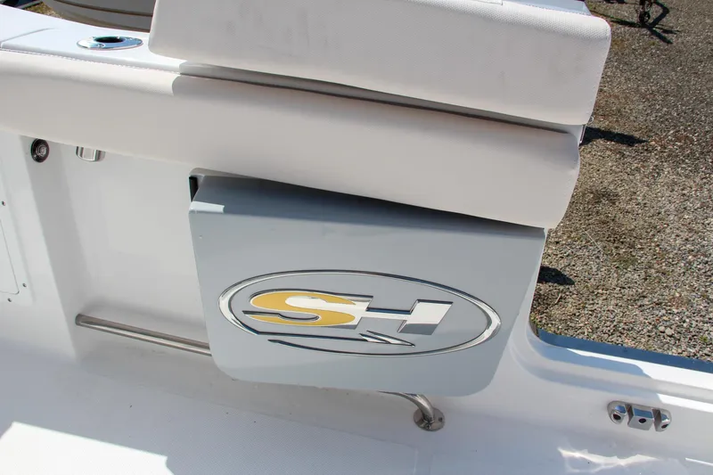 Slide: The Image of Sea Hunt Ultra 275 SE 2025 boat seat with SH logo detail. - 27