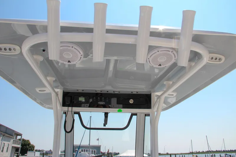Slide: The Image of 2025 Sea Hunt Ultra 275 SE boat roof with rod holders and speakers. - 28