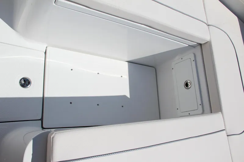 Slide: The Image of 2025 Sea Hunt Ultra 275 SE boat seating and storage area. - 49