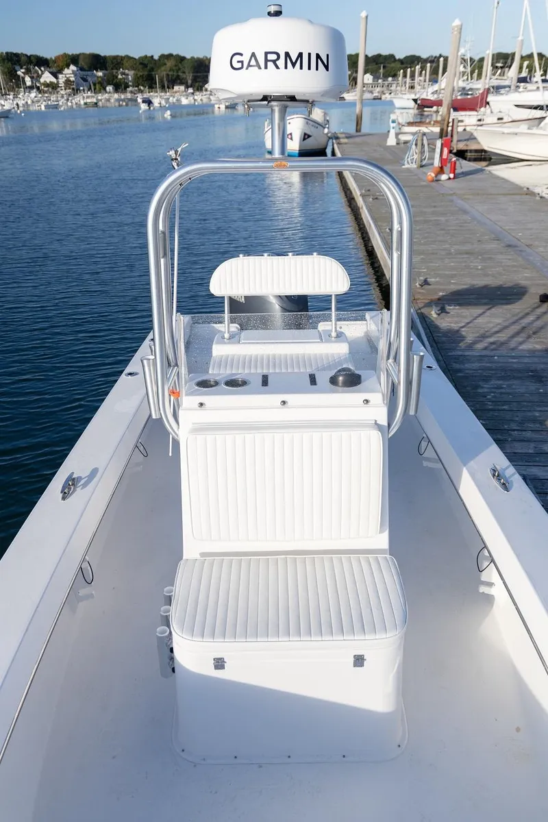 Slide: The Image of 2024 Jones Brothers 23 Cape Fisherman boat docked with Garmin equipment. - 5