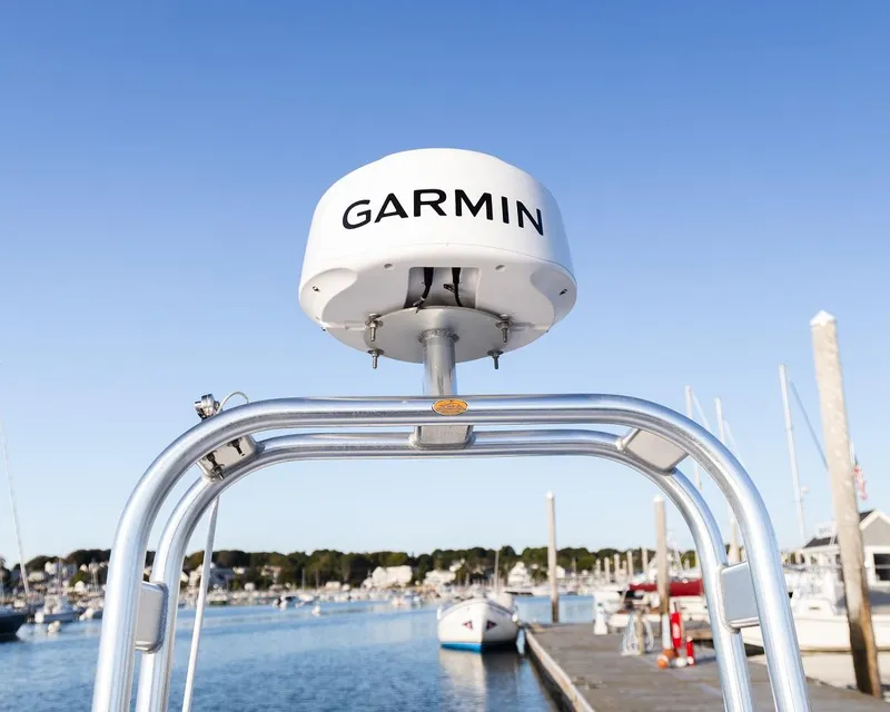 Slide: The Image of Garmin radar on 2024 Jones Brothers 23 Cape Fisherman boat at marina. - 6
