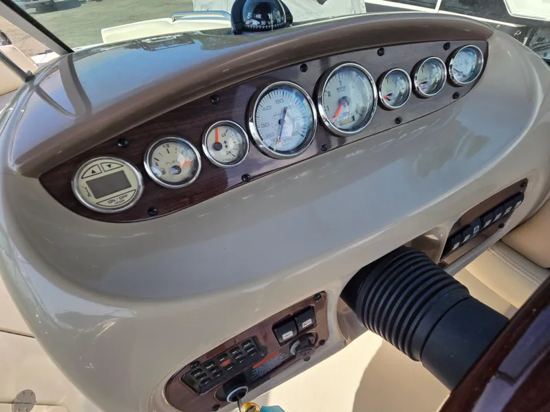 Slide: The Image of Dashboard of 2005 Chaparral 236 Sunesta boat with gauges and controls. - 15