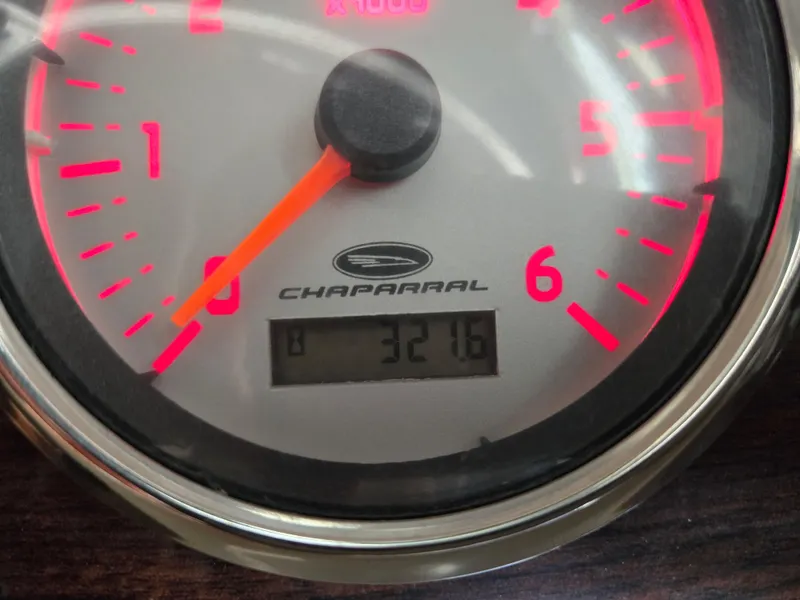 Slide: The Image of Close-up of 2005 Chaparral 236 Sunesta tachometer displaying 321.6 hours. - 32