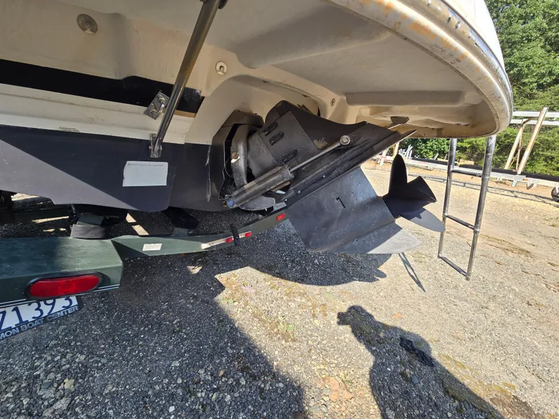 Slide: The Image of Rear view of a 2005 Chaparral 236 Sunesta boat on a trailer. - 5