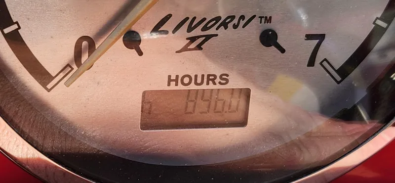 Slide: The Image of Close-up of a Livorsi II hour meter showing 946 hours on a 2005 Baja 202 Islander. - 18