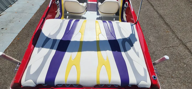 Slide: The Image of 2005 Baja 202 Islander boat with colorful upholstery design. - 9