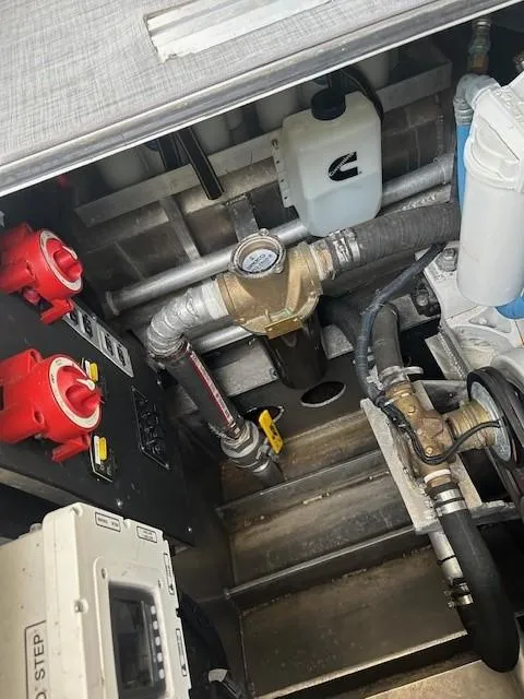 Slide: The Image of Engine compartment of 2023 Smoky Mountain asymmetrical foil-assisted catamaran, showing mechanical components. - 18