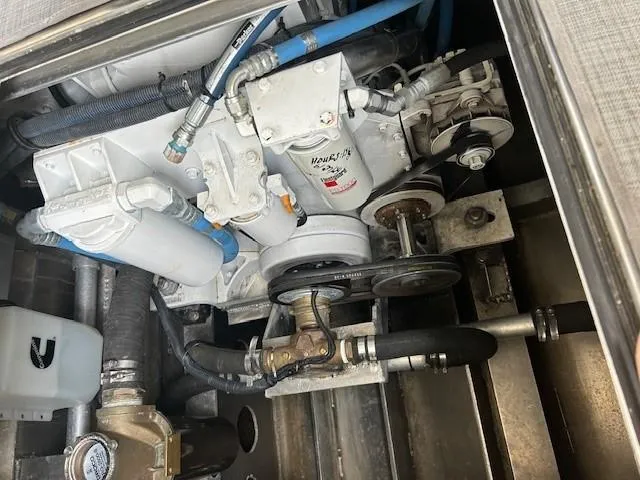 Slide: The Image of Engine compartment of 2023 Smoky Mountain asymmetrical foil assisted catamaran, showcasing mechanical components. - 19