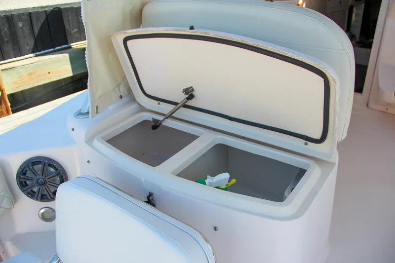 Slide: The Image of Open storage compartment on 2003 Grady-White Express 330 boat. - 17
