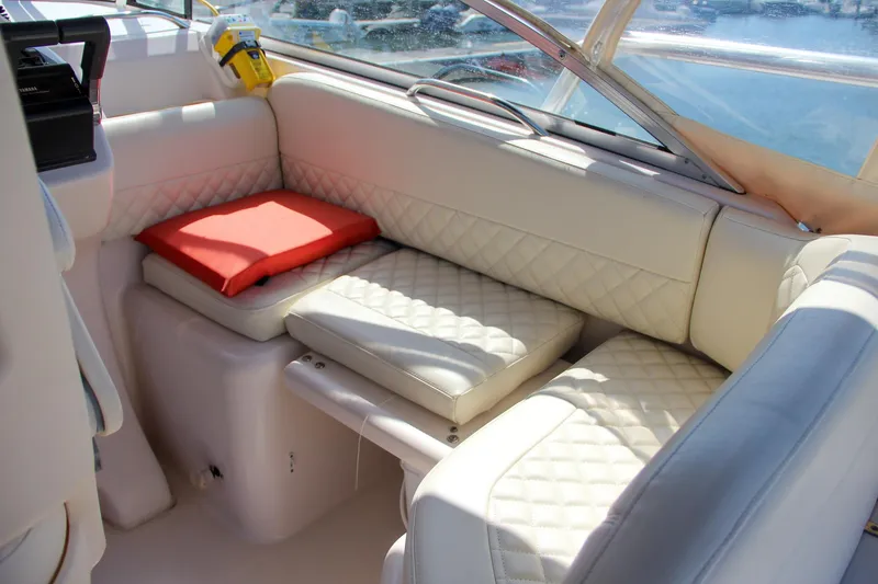 Slide: The Image of Luxurious seating area on 2003 Grady-White Express 330 boat with quilted upholstery. - 21