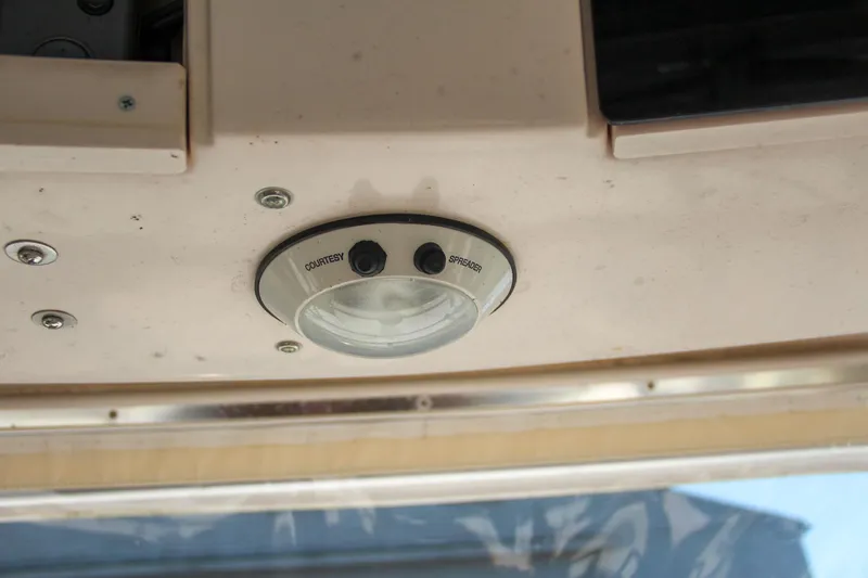Slide: The Image of Ceiling light fixture on 2003 Grady-White Express 330 boat interior. - 30