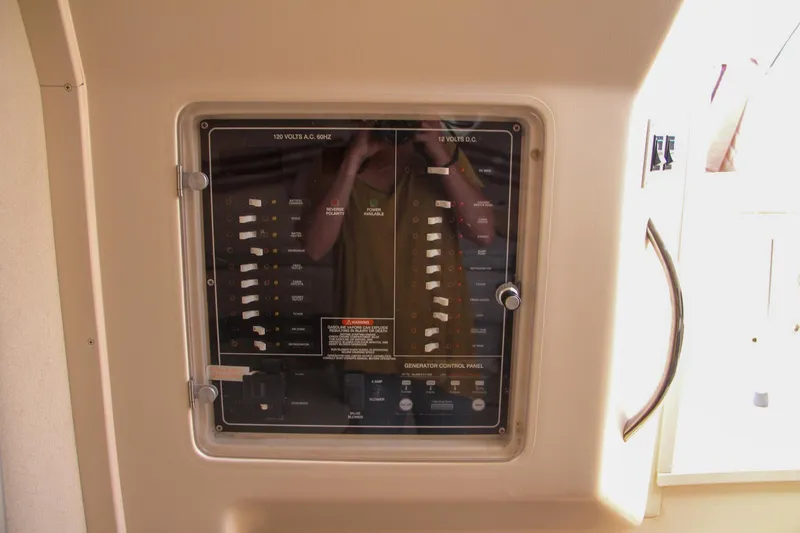 Slide: The Image of Electrical control panel on 2003 Grady-White Express 330 boat. - 39