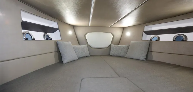 Slide: The Image of Interior cabin of 2025 Ranieri 330LX boat with cushions and windows. - 18