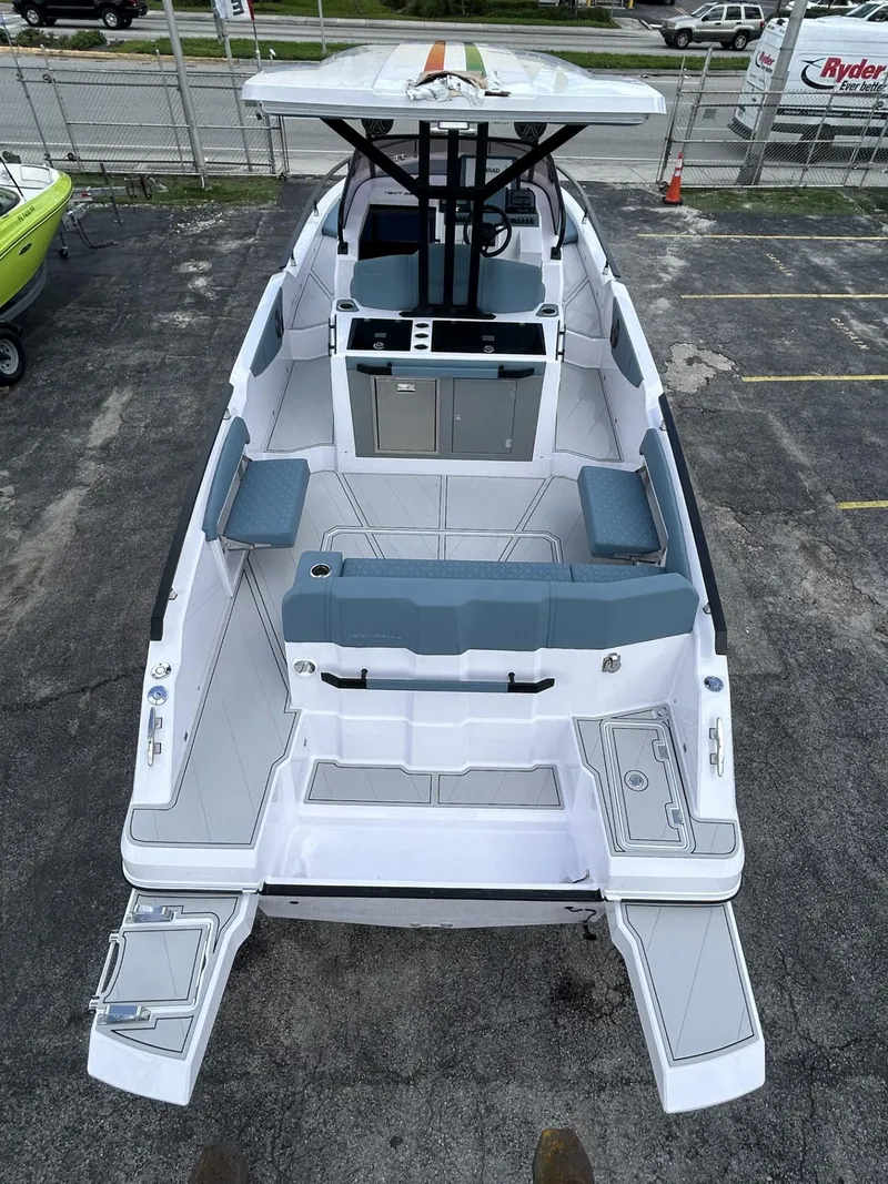 Slide: The Image of 2025 Ranieri 330LX boat with spacious deck and modern seating. - 28