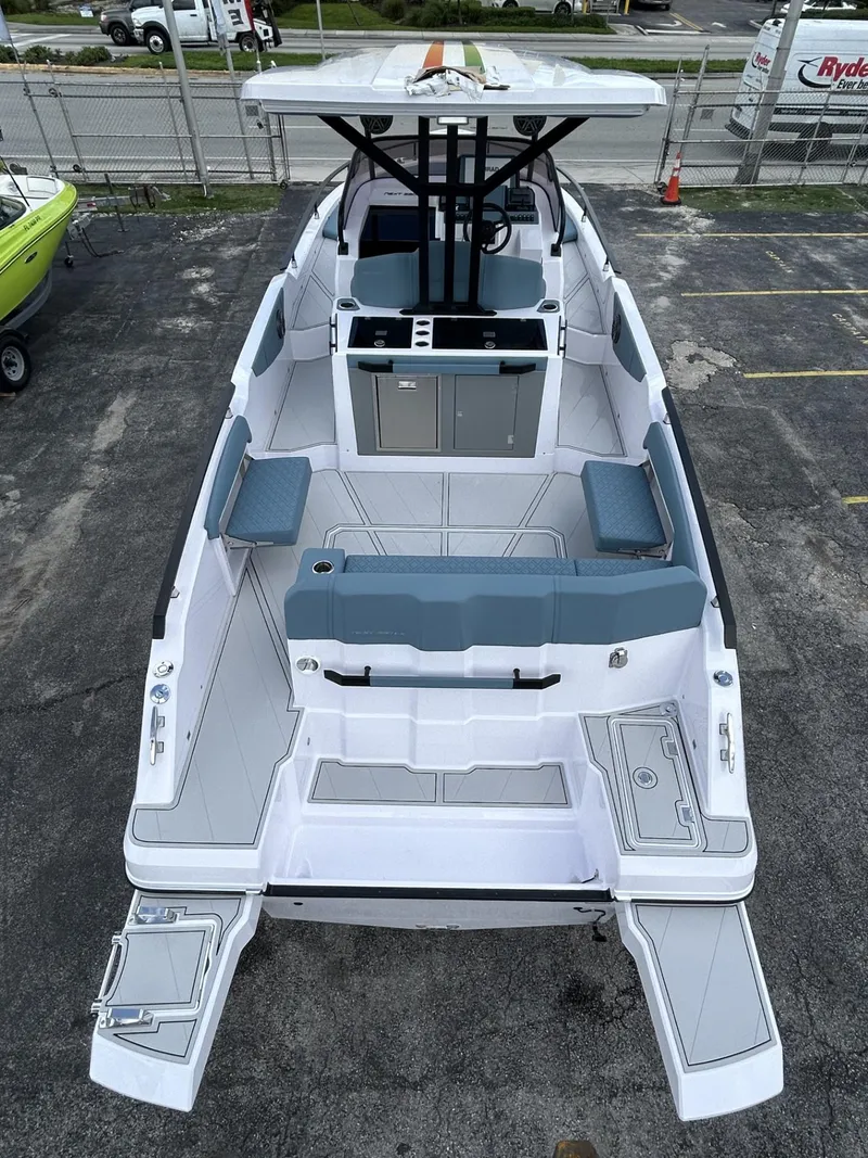 Slide: The Image of 2025 Ranieri 330LX boat with spacious deck and modern seating. - 30