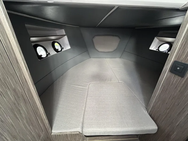 Slide: The Image of Interior cabin of 2025 Ranieri 330LX boat with modern design and comfortable seating. - 46