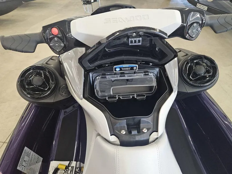 Slide: The Image of 2025 Sea-Doo GTI™ SE 170 dashboard with audio system and storage compartment. - 9