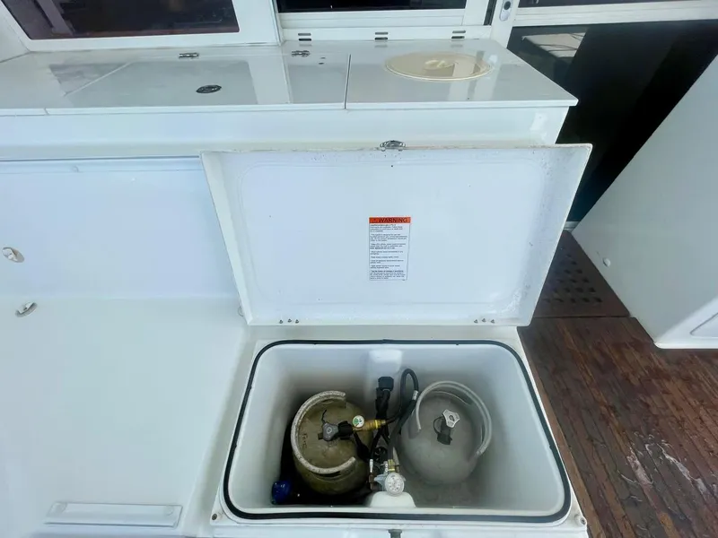 Slide: The Image of Propane locker in cockpit area - 57