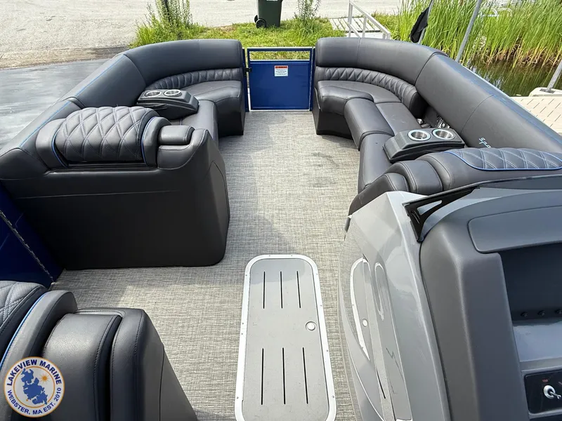 Slide: The Image of 2024 Bennington RX 23 RXSBA pontoon boat interior with luxurious seating and cup holders. - 5