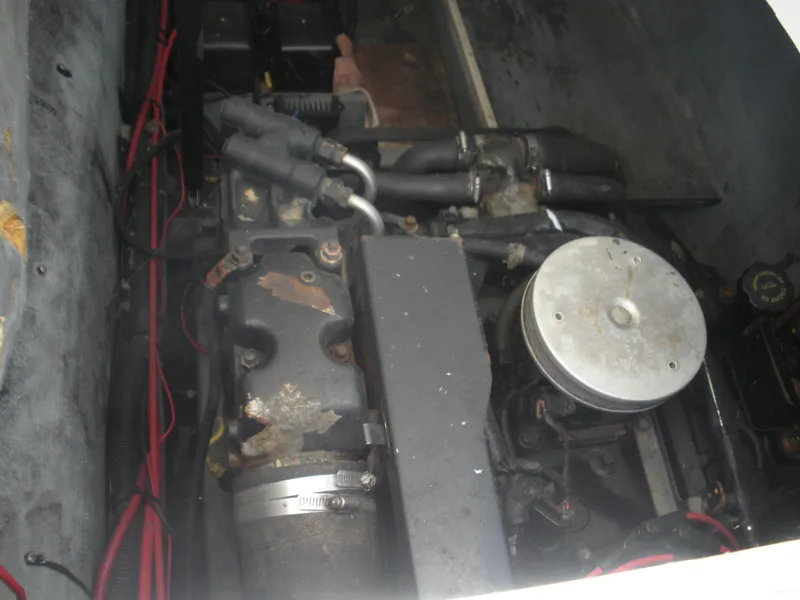 Slide: The Image of Engine compartment of a 1999 Baha Cruisers 290 King Cat Ht boat. - 14