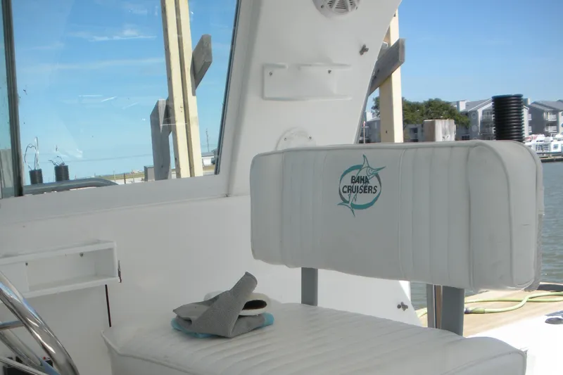 Slide: The Image of Interior of 1999 Baha Cruisers 290 King Cat Ht boat with branded seating. - 9