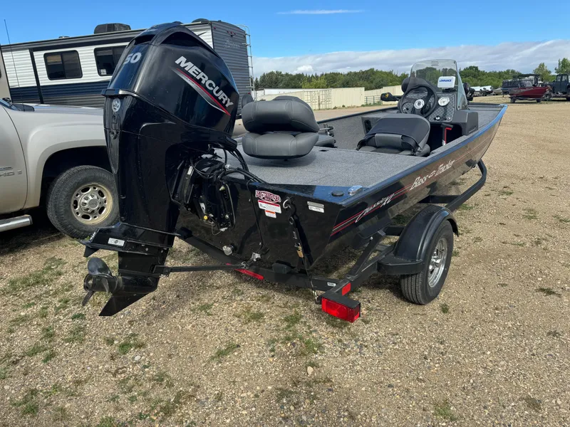 Slide: The Image of 2024 Tracker Bass Tracker Classic XL boat with Mercury engine on a trailer. - 3