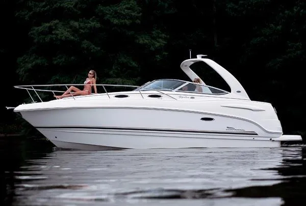Slide: The Image of 2005 Chaparral Signature 270 boat interior with white seating and cup holder. - 10
