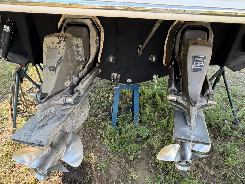 Slide: The Image of 2005 Chaparral Signature 270 boat with dual propellers on land. - 24