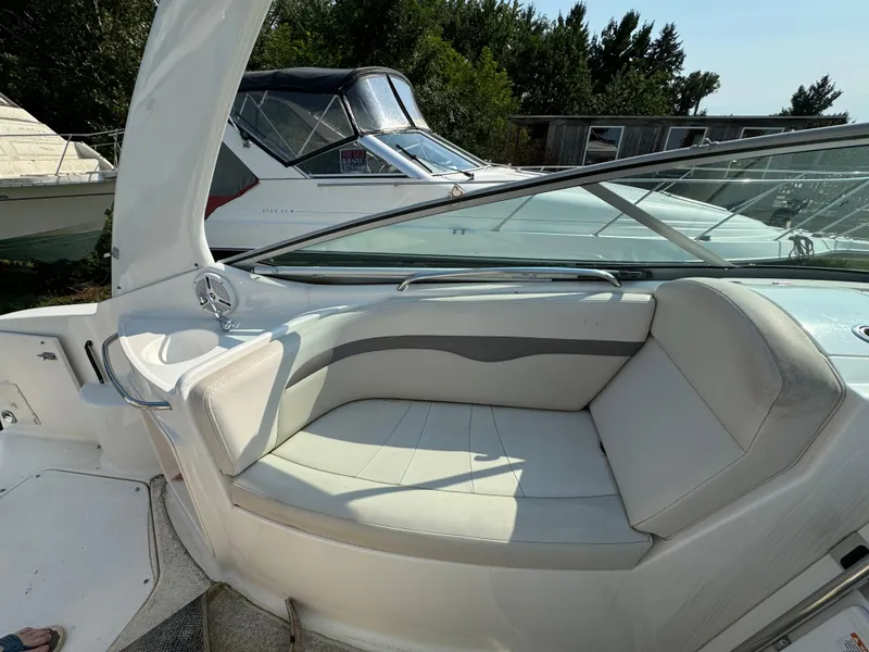 Slide: The Image of 2005 Chaparral Signature 270 boat dashboard with gauges and controls. - 8