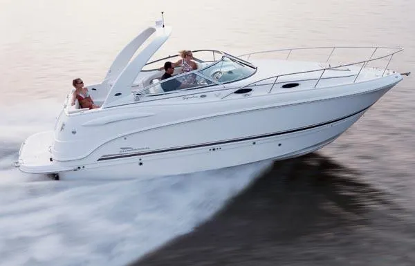 Slide: The Image of 2005 Chaparral Signature 270 boat interior with windshield, docked under canopy. - 9