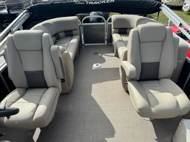 Slide: The Image of 2023 Sun Tracker Party Barge 22 XP3 interior with plush seating and spacious layout. - 11