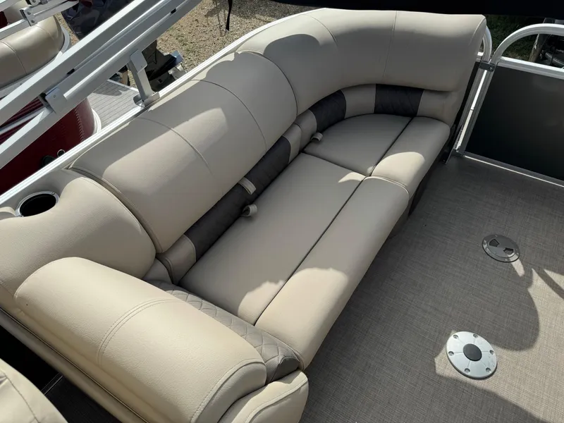 Slide: The Image of 2023 Sun Tracker Party Barge 22 XP3 beige seating area with cup holders. - 14