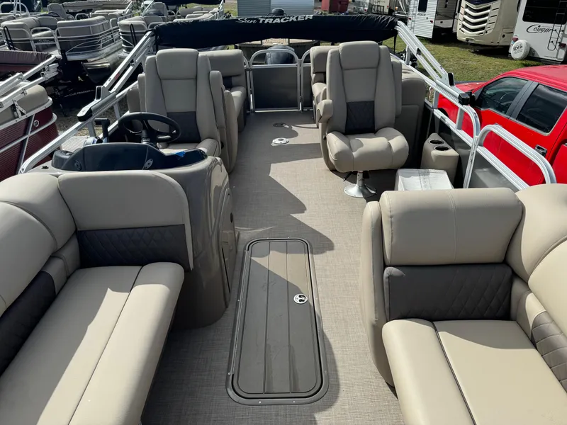 Slide: The Image of 2023 Sun Tracker Party Barge 22 XP3 interior with spacious seating and modern design. - 6