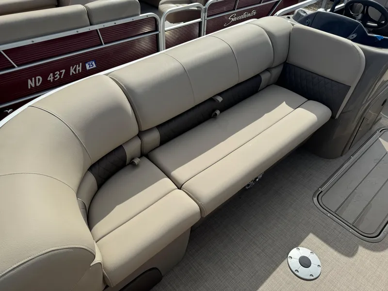 Slide: The Image of 2023 Sun Tracker Party Barge 22 XP3 interior seating, beige upholstery, spacious and comfortable design. - 7