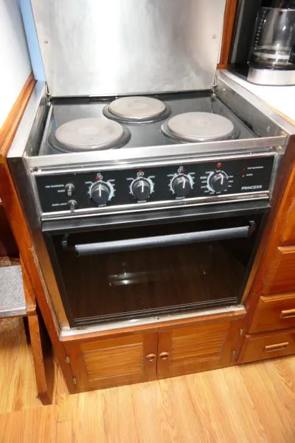 Slide: The Image of Electric stove and oven in 1986 Nova 36 Sundeck yacht kitchen. - 19