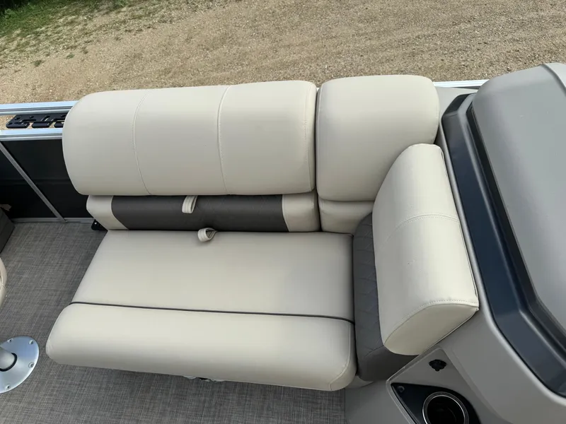 Slide: The Image of 2024 Sun Tracker Fishin' Barge 20 DLX, beige seating, spacious and comfortable design. - 13