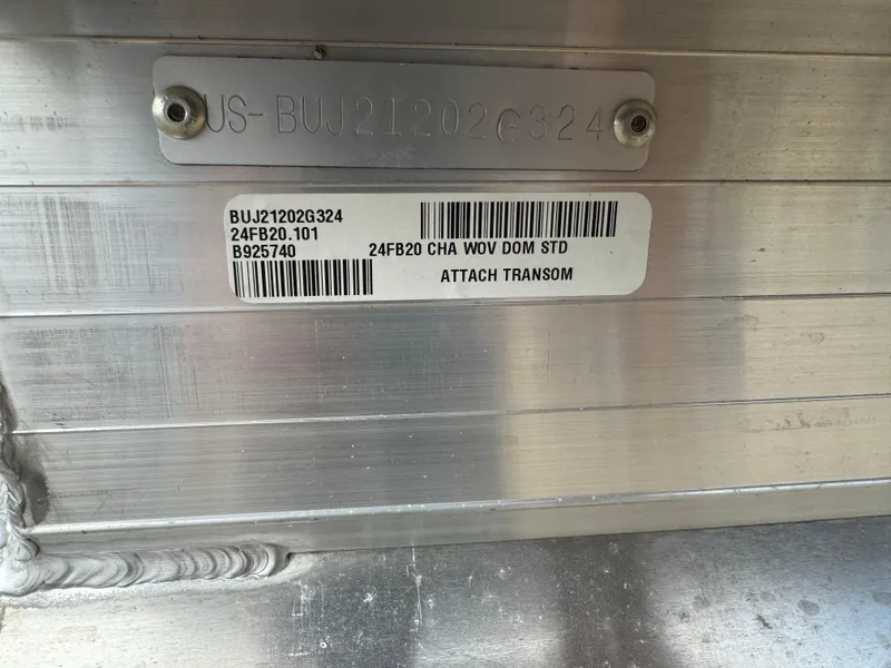 Slide: The Image of 2024 Sun Tracker Fishin' Barge 20 DLX identification plate with serial numbers. - 5