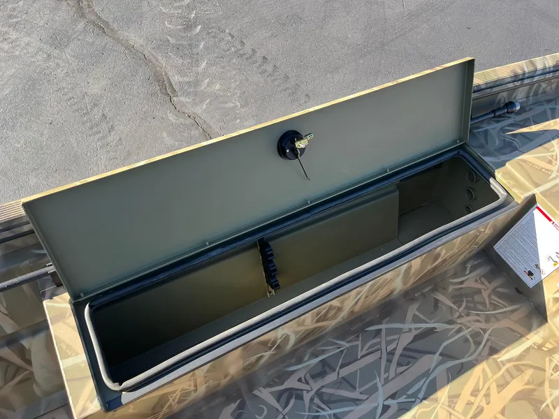 Slide: The Image of Open storage compartment in 2025 Lowe Roughneck 1760 boat. - 13