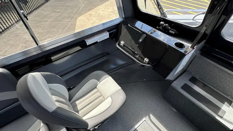 Slide: The Image of 2024 Spartan 184 ASTORIA boat interior with modern seating and sleek design. - 4