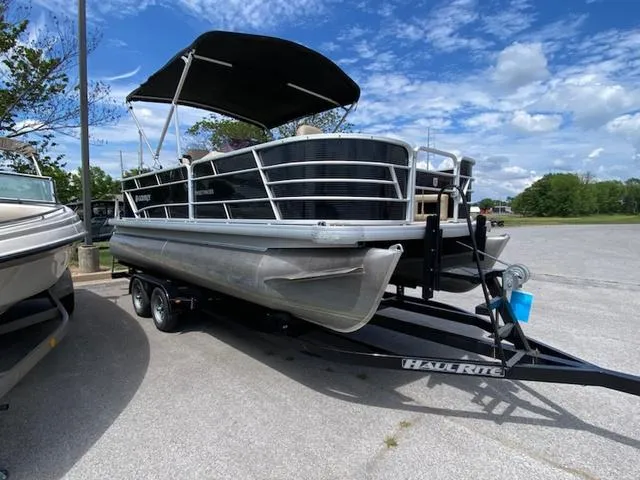 Slide: The Image of Dashboard of 2020 Godfrey SW2086F boat with gauges and controls, Sunrise Marine logo. - 10