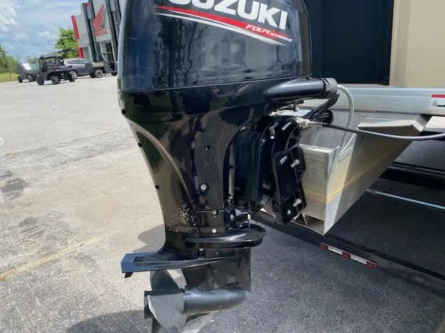 Slide: The Image of 2020 Godfrey SW2086F pontoon boat interior with beige seating and table. - 4