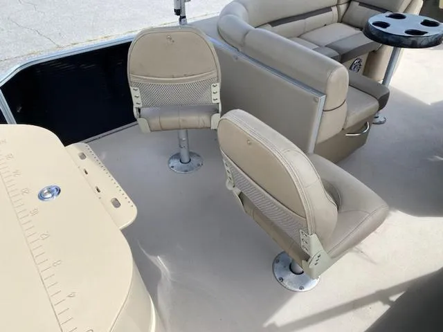 Slide: The Image of Luxurious 2020 Godfrey SW2086F pontoon boat with spacious seating and cup holders. - 6