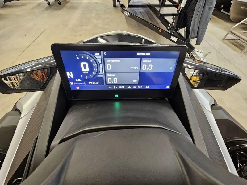 Slide: The Image of 2025 Sea-Doo GTX™ Limited 325 dashboard display, showing speed and navigation details. - 3