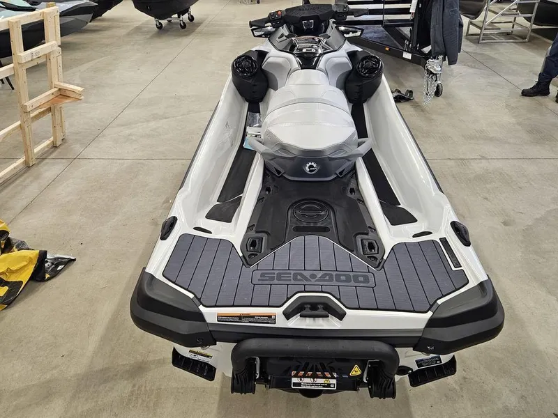 Slide: The Image of 2025 Sea-Doo GTX™ Limited 325 in White Pearl, displayed in a showroom. - 6
