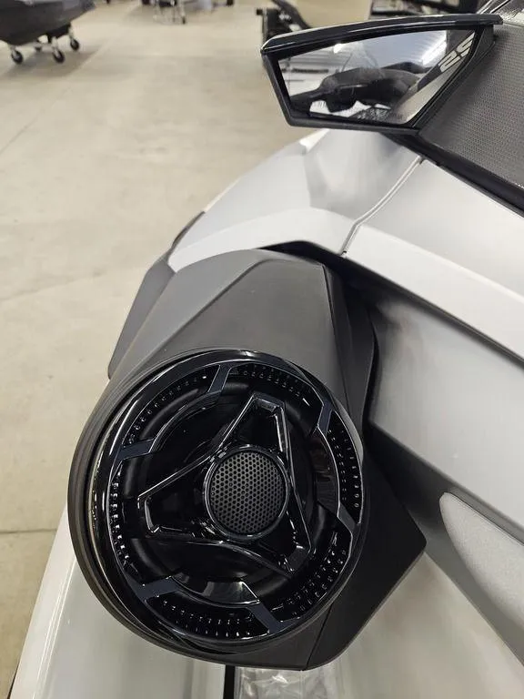 Slide: The Image of 2025 Sea-Doo GTX™ Limited 325, White Pearl Premium, close-up of sleek speaker design. - 8