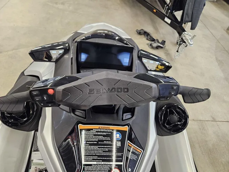 Slide: The Image of 2025 Sea-Doo GTX™ Limited 325 White Pearl Premium dashboard and controls. - 9