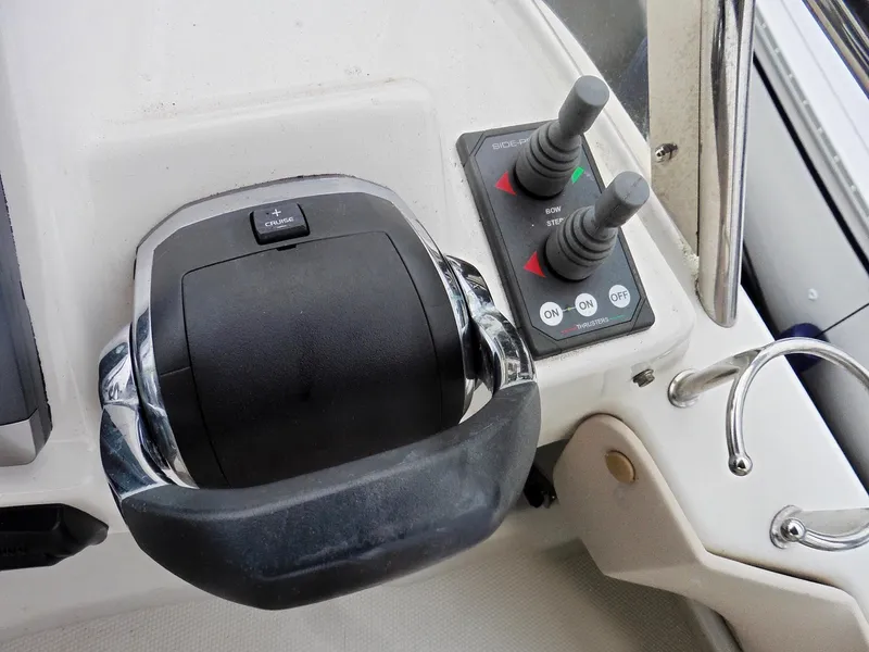 Slide: The Image of Cutwater 30CB 2015 boat throttle and control panel close-up. - 37